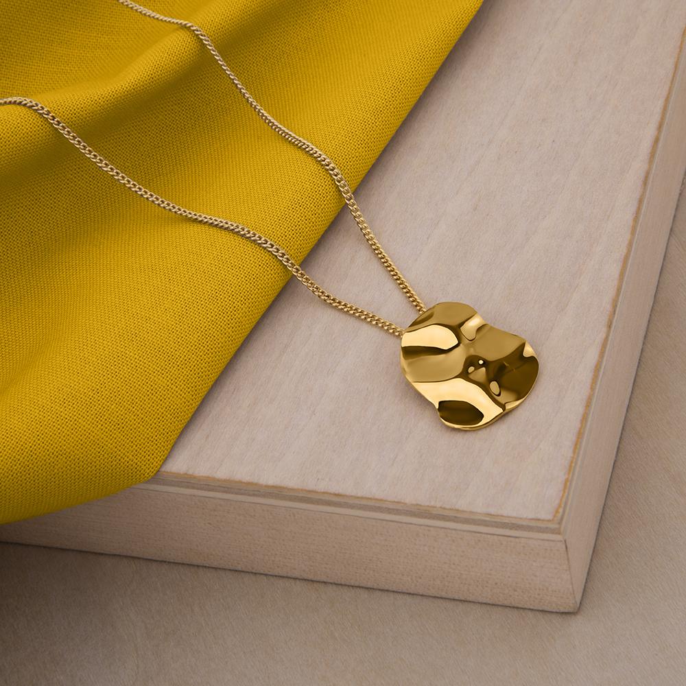 Republic Road Mirer Marvel Necklace in Gold on Wood 
